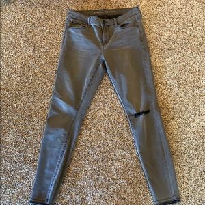 Women light distressed jean